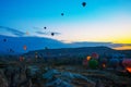 Cappadocia, Goreme, Anatolia, Turkey. Many Hot air balloon flying over rocks formations valley panorama spectacular Cappadocia
