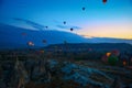 Cappadocia, Goreme, Anatolia, Turkey. Many Hot air balloon flying over rocks formations valley panorama spectacular Cappadocia