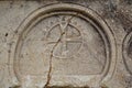 Cappadocia, Turkey - 26 August 2019 - Stone wall with historic mark carved of church in Goreme National Park, Cappadocia, Turkey. Royalty Free Stock Photo