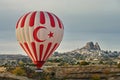 Balloons and hilly landscape. Balloon. Goreme, Cappadocia - landmark attraction in Turkey Royalty Free Stock Photo