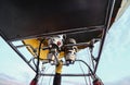 Cappadocia  Turkey - December 06 2019 close up Voyager Balloons captain with winter glove control the fuel on hot air balloon Royalty Free Stock Photo