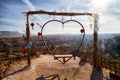 Cappadocia, Turkey - December 20, 2019: Ethnic things and toys and view from top place on the strange landscape in the Cappadocia