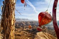 Cappadocia, Turkey - December 20, 2019: Ethnic things and toys and view from top place on the strange landscape in the Cappadocia