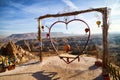 Cappadocia, Turkey - December 20, 2019: Ethnic things and toys and view from top place on the strange landscape in the Cappadocia