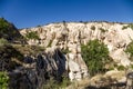 Cappadocia, Turkey. Goreme National Park: the canyon walls with ancient artificial caves Royalty Free Stock Photo