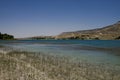 Lake with light blue water in the South Cappadocia Valley.