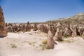 Cappadocia, Turkey. Landscape with beautiful figures of weathering in a mountain valley Royalty Free Stock Photo