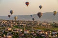 CAPPADOCIA, TURKEY - MAY 04, 2018: Hot air balloon flying over rock landscape at Cappadocia Turkey. Royalty Free Stock Photo