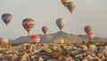 CAPPADOCIA, TURKEY - MAY 04, 2018: Hot air balloon flying over rock landscape at Cappadocia Turkey Royalty Free Stock Photo
