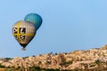 CAPPADOCIA, TURKEY - MAY 04, 2018: Hot air balloon flying over rock landscape at Cappadocia Turkey. Royalty Free Stock Photo