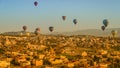 CAPPADOCIA, TURKEY - MAY 04, 2018: Hot air balloon flying over rock landscape at Cappadocia Turkey. Royalty Free Stock Photo
