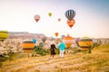 Cappadocia Turkey during sunrise, couple mid age men and woman on vacation in the hills of Goreme Capadocia Turkey, men Royalty Free Stock Photo