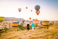 Cappadocia Turkey during sunrise, couple mid age men and woman on vacation in the hills of Goreme Capadocia Turkey, men Royalty Free Stock Photo