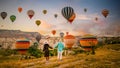 Cappadocia Turkey during sunrise, couple mid age men and woman on vacation in the hills of Capadocia Royalty Free Stock Photo