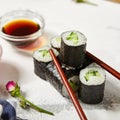Cappamaki Sushi Roll with Soy Sauce and Ginger over White Texture Background Royalty Free Stock Photo