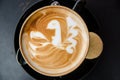 A cappuccino with a bird in latte art Royalty Free Stock Photo