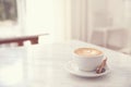 Cappuccino coffee cup on white marble table Royalty Free Stock Photo