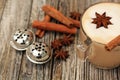 Cappuccino with star cinnamon sticks. Two Silver Jingle bell Royalty Free Stock Photo