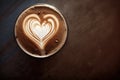 Cappuccino heart painted with coffee foam. Top view