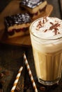 Cappuccino in high glass with chocolate topping Royalty Free Stock Photo