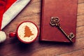 Cappuccino with key and book Royalty Free Stock Photo