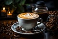 a cappuccino with latte art on a wooden table with coffee beans and candles banco de imagens