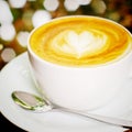 Cappuccino or latte coffee with heart shape, retro effect Royalty Free Stock Photo