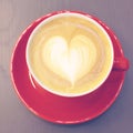 Cappuccino or latte coffee with heart shape Royalty Free Stock Photo