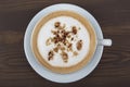 Cappuccino or latte with frothy foam, blue coffee cup top view closeup isolated on white background. Cafe and bar, barista art Royalty Free Stock Photo