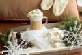 Cappuccino with marshmallows, cinnamon and star anise on blue wooden table Royalty Free Stock Photo