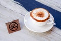 Cappuccino with no smoking sign