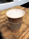 Cappuccino, paper cup, coffee shop, top view