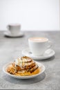 Cappuccino and rolled bun with caramel Royalty Free Stock Photo