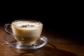 Cappuccino on wood table Royalty Free Stock Photo