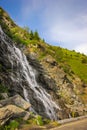 Capra waterfall on the course of the river Capra by the famous road Transfagarasan Royalty Free Stock Photo