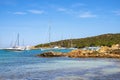 Caprera Island and Spiaggia I Due Mari beach at the Tyrrhenian Sea coastline with Caprera harbor and La Maddalena archipelago in