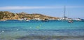 Caprera Island and Spiaggia I Due Mari beach at the Tyrrhenian Sea coastline with Caprera harbor and La Maddalena archipelago in