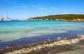 Caprera Island and Spiaggia I Due Mari beach at the Tyrrhenian Sea coastline with Caprera harbor and La Maddalena archipelago in