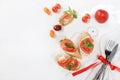 Caprese Bruschetta toast with mozzarella cheese, cherry tomatoes and fresh garden Basil.Traditional Italian food, healthy natural Royalty Free Stock Photo