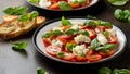 Caprese salad with cherry plum tomatoes, mozzarella cheese and basil. Healthy vegetarian food Royalty Free Stock Photo