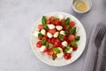 Caprese salad with cherry tomatoes , mozzarella cheese, basil Royalty Free Stock Photo