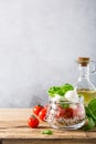 Caprese salad in glass jar. Royalty Free Stock Photo