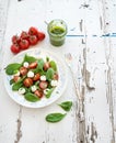 Caprese salad, homemade pesto sauce. Cherry