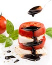 Caprese salad with mozzarella and tomato and balsamic glaze