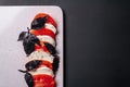 Caprese salad with tomatoes, basil and mozzarella. Top view and flat lay Royalty Free Stock Photo