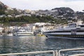 Capri island, Italy - April 12, 2017: Panorama of the seaport Marina Grande, view from the water on ships and colorful Royalty Free Stock Photo