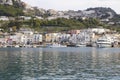 Capri island, Italy - April 12, 2017: Panorama of the seaport Marina Grande, view from the water on ships and colorful Royalty Free Stock Photo