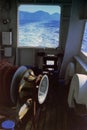 CAPRI, ITALY, 1965 - The anchor winch of a ferry greets the island of Capri, which moves away into the background Royalty Free Stock Photo