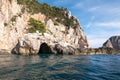 Caves in the cliffs on the island of Capri in the Bay of Naples, Italy. Photographed whilst on a boat trip around the island. Royalty Free Stock Photo
