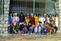 CAPRI, ITALY, 1987 - A group of schoolchildren smile, at a street in Capri, in the warm winter sun at the end of their school day